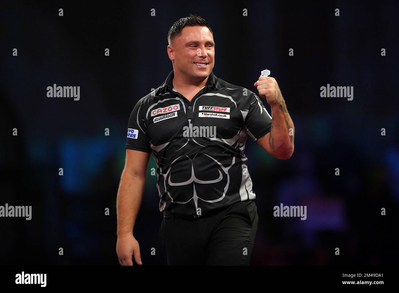 Wales' Gerwyn Price in action against England's Luke Woodhouse during day five of the Cazoo