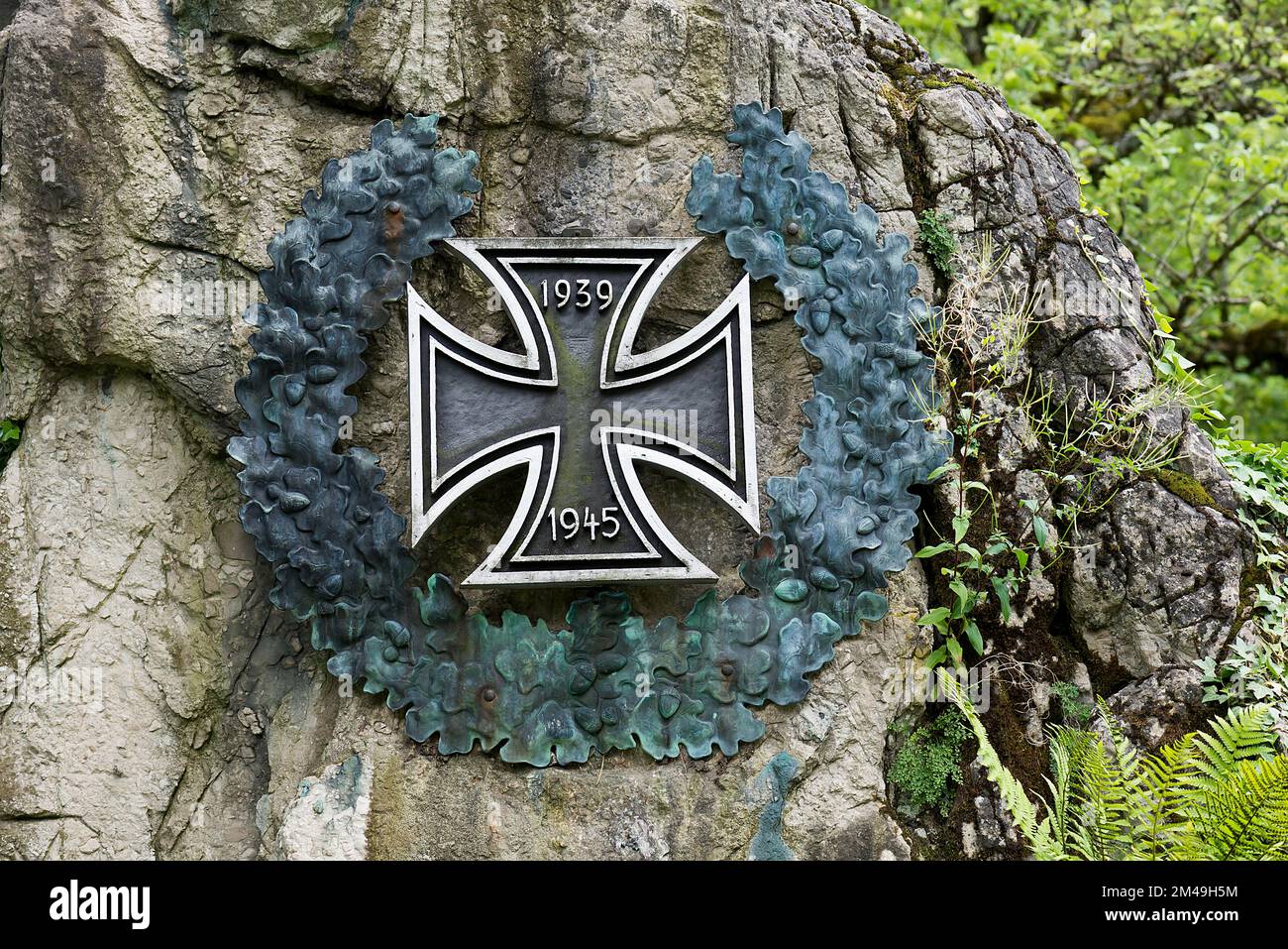 The Iron Cross with laurel wreath on a war memorial of both World Wars, Bad Hindelang, Allgaeu, Bavaria, Germany Stock Photo