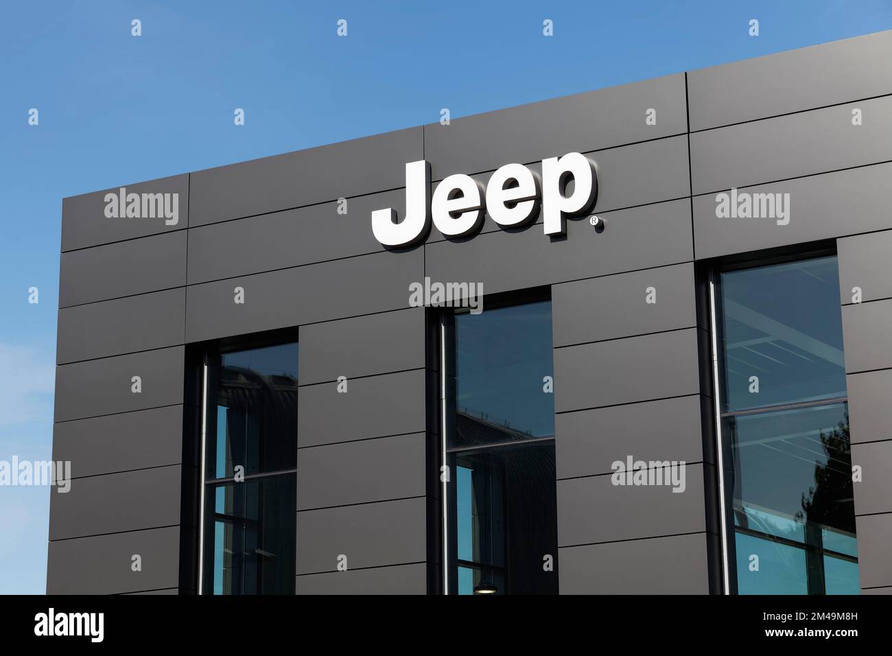 Jeep, logo on a car dealership, car brand for offroad vehicles