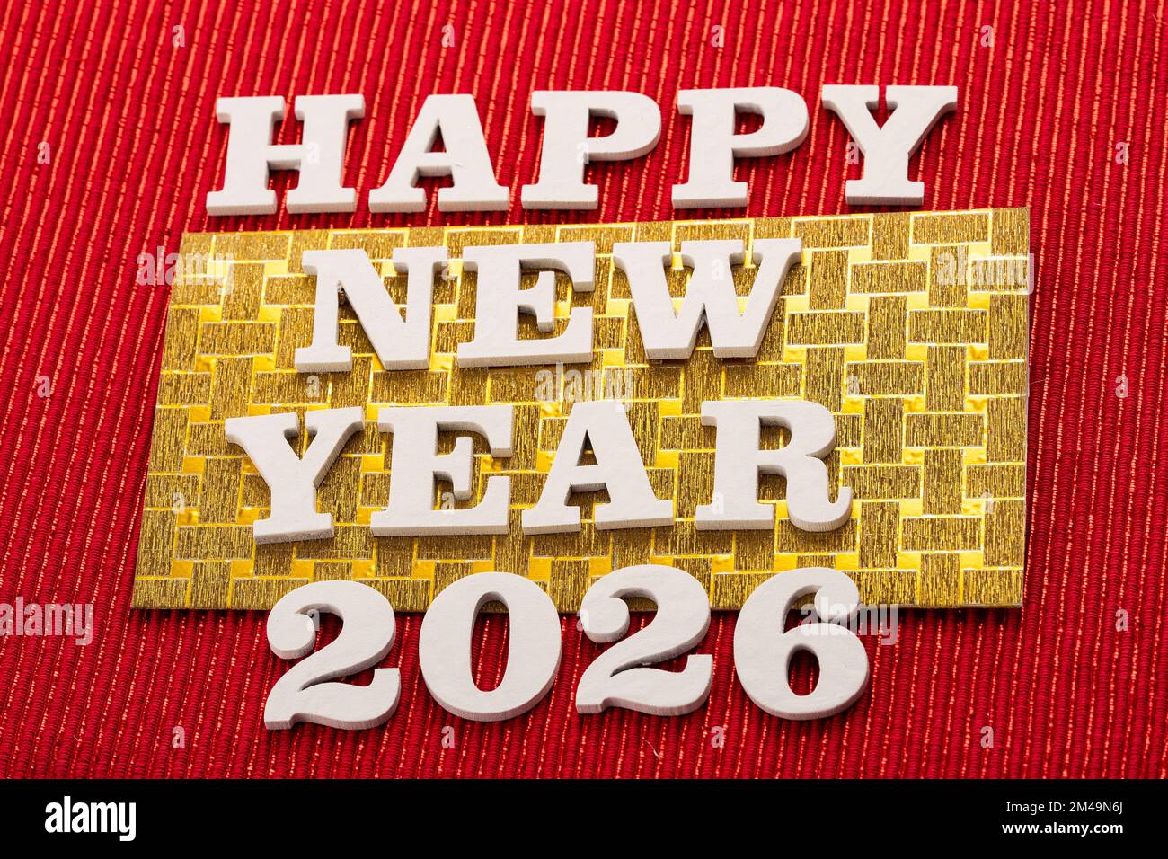 Happy new year 2026 in white letters on red background Stock Photo Alamy