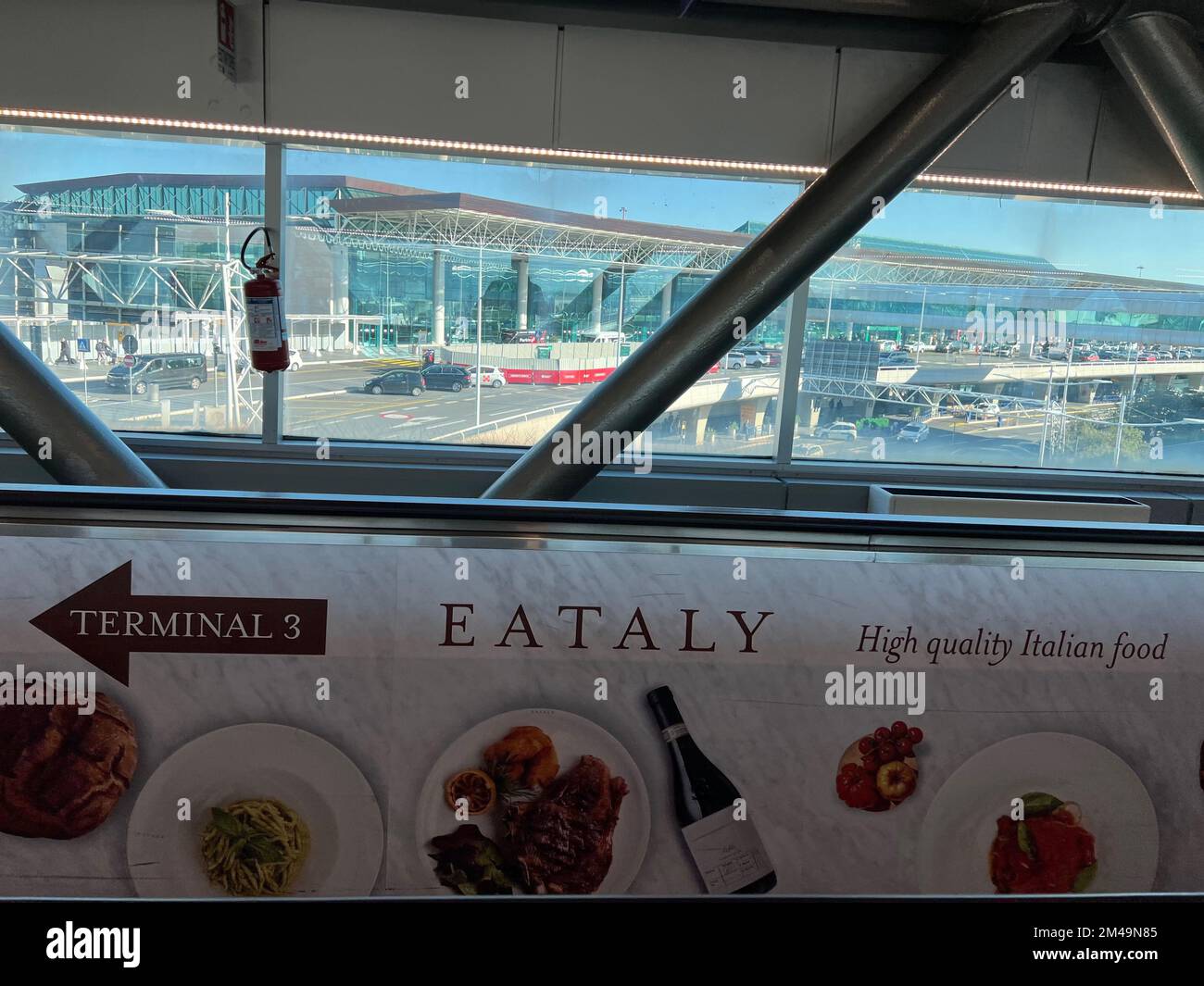 a-sign-for-eataly-directs-passengers-to-its-store-at-fiumicino-airport