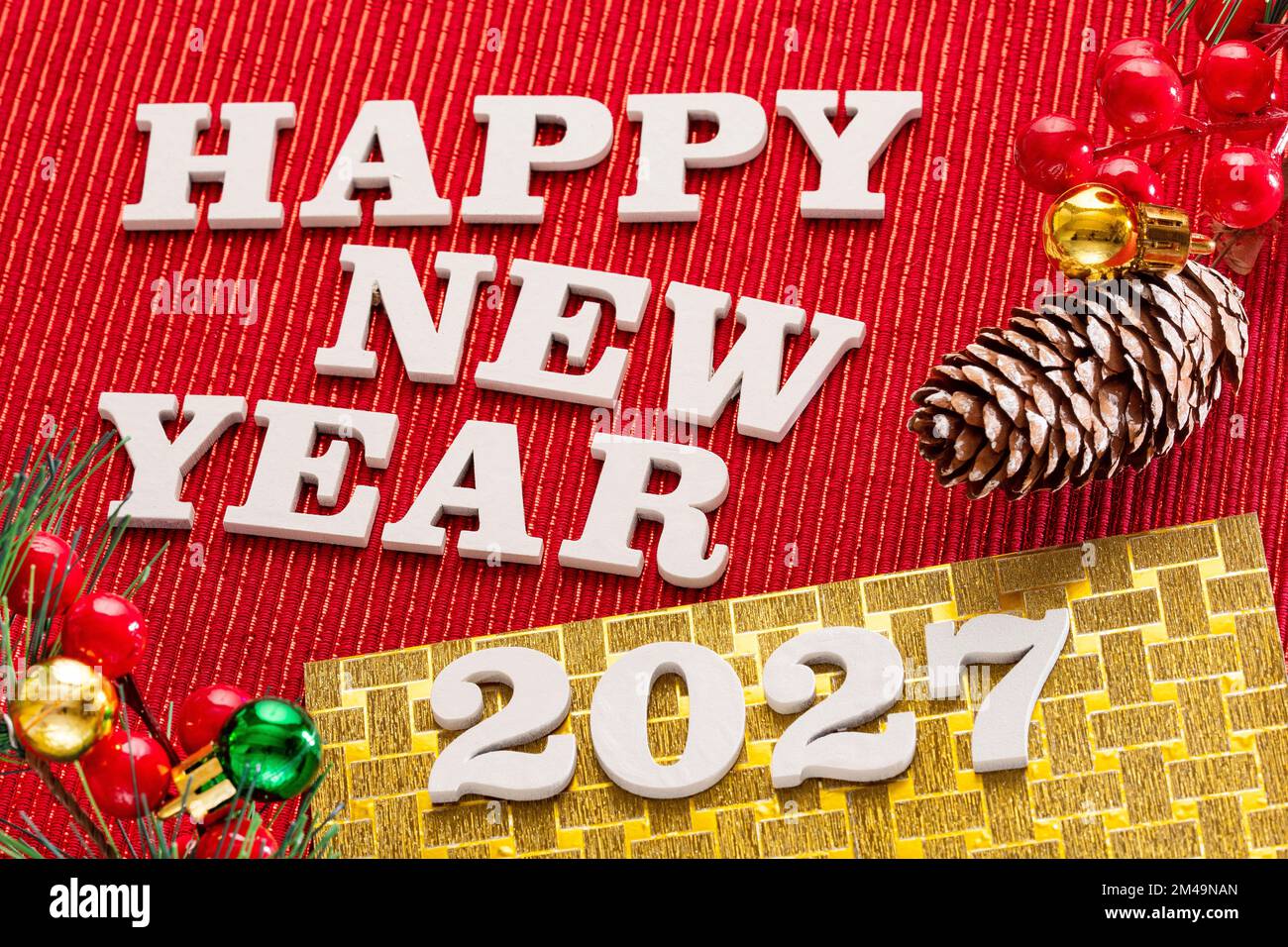 Happy new year 2027 in white letters on red background Stock Photo Alamy
