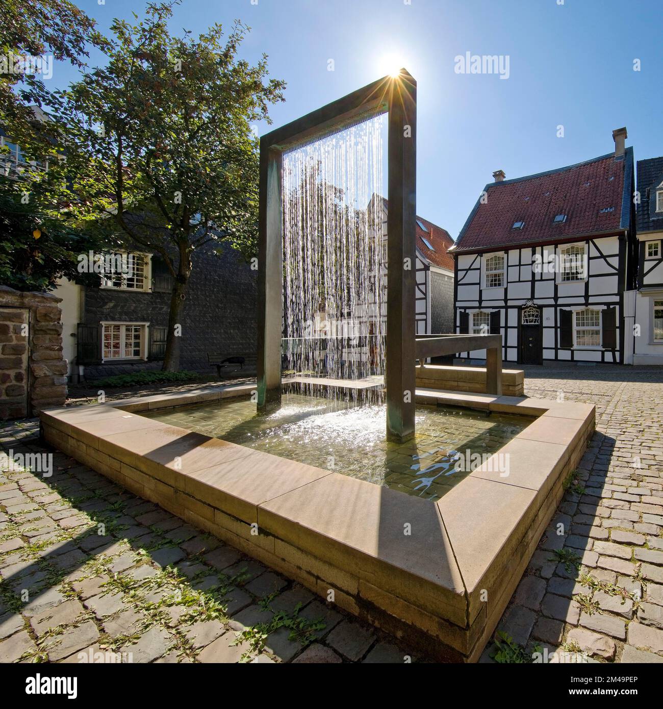 Weavers' Fountain by Wolfgang Liesen on Tuchmacherplatz, Old Town, Kettwig, Essen, Ruhr Area, North Rhine-Westphalia, Germany Stock Photo