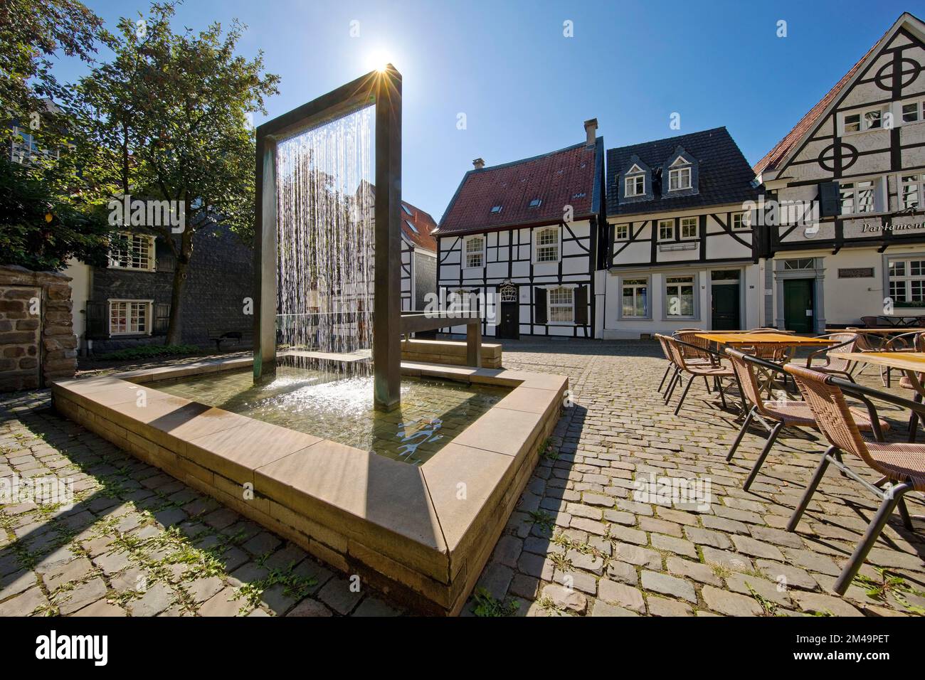 Weavers' Fountain by Wolfgang Liesen on Tuchmacherplatz, Old Town, Kettwig, Essen, Ruhr Area, North Rhine-Westphalia, Germany Stock Photo