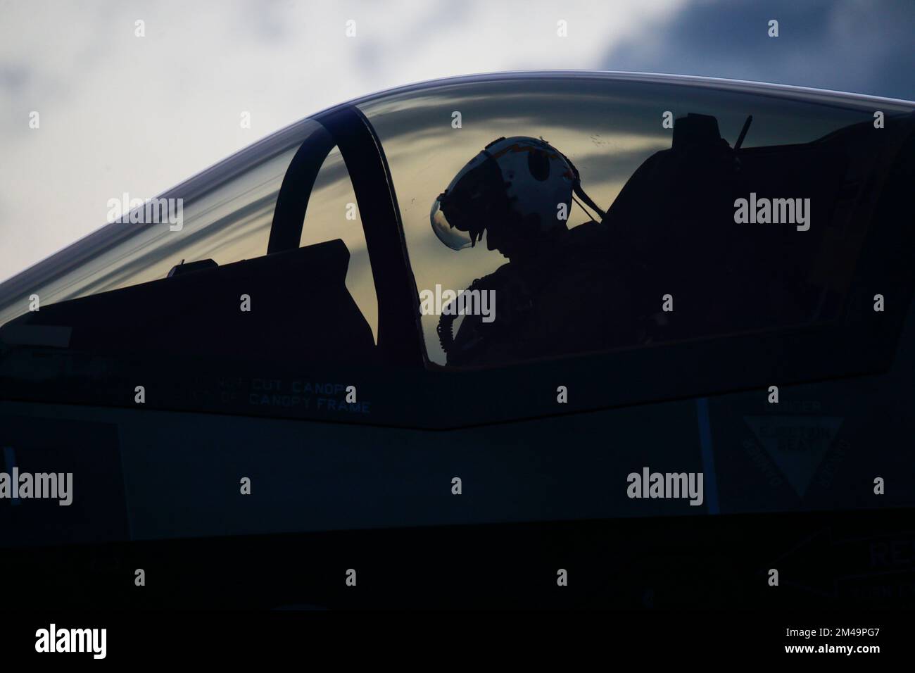 U.S. Marine Corps Maj. Benjamin Boera, a pilot with Marine Fighter Attack Squadron 242, conducts pre-flight checks on an F-35B Lightning II aircraft during Ryukyu Vice 23.1 at Kadena Air Base, Okinawa, Japan, Dec. 13, 2022. Ryukyu Vice is a joint, fixed-wing aviation command and control exercise that provides critical training to 1st Marine Aircraft Wing tactical air control personnel through offensive, defensive and counter-air live-flight scenarios.(U.S. Marine Corps photo by Lance Cpl. Samantha Rodriguez) Stock Photo