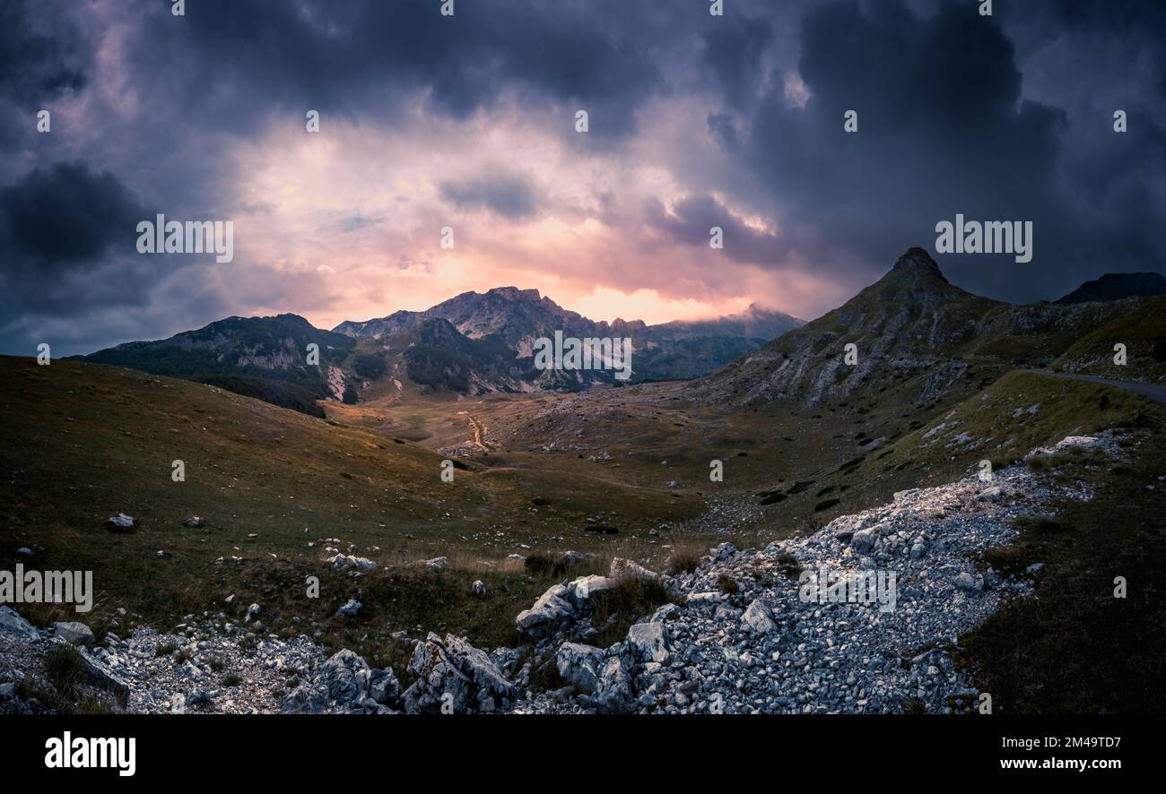 A beautiful view of hills and mountains under the cloudy sky during ...