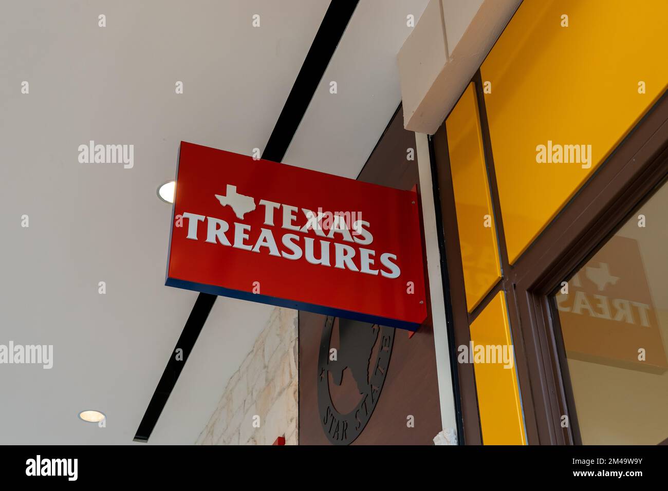 Houston, Texas, USA - March 6, 2022: A Texas Treasures store projecting sign at a shopping mall. Stock Photo