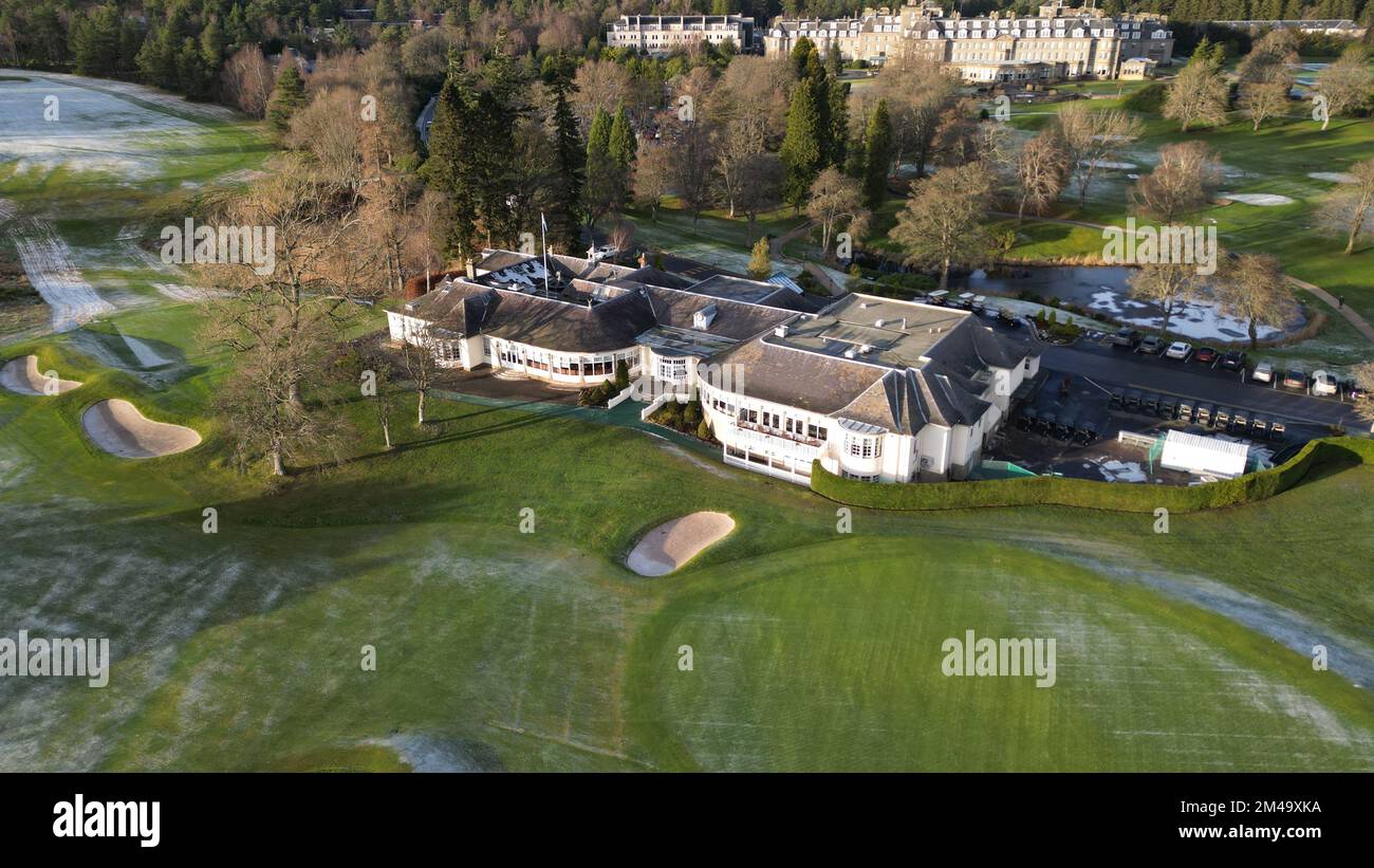 An aerial view of a Gleneagles Golf Course with a hotel in the middle surrounded with trees, Stock Photo