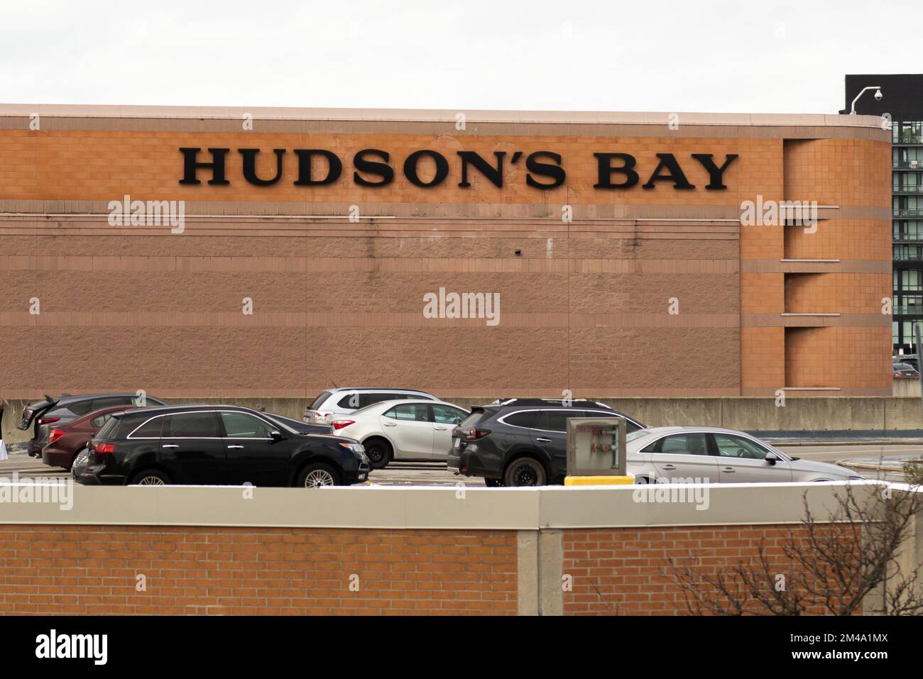 Toronto, ON, Canada – December 17, 2022: The logo and brand sign of Hudson's Bay Company. The Hudson's Bay Company is a Canadian retail business group Stock Photo