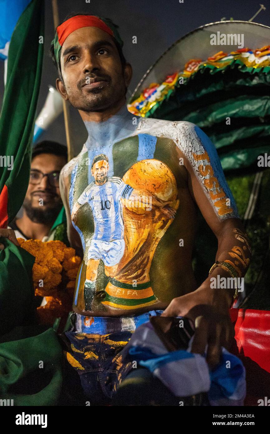 Dhaka, Bangladesh. 19th Dec, 2022. A fan display his body art of Lionel  Andres Messi with the World cup trophy. Messi, finally a World Cup winner,  lead Argentina to a 4-2 win