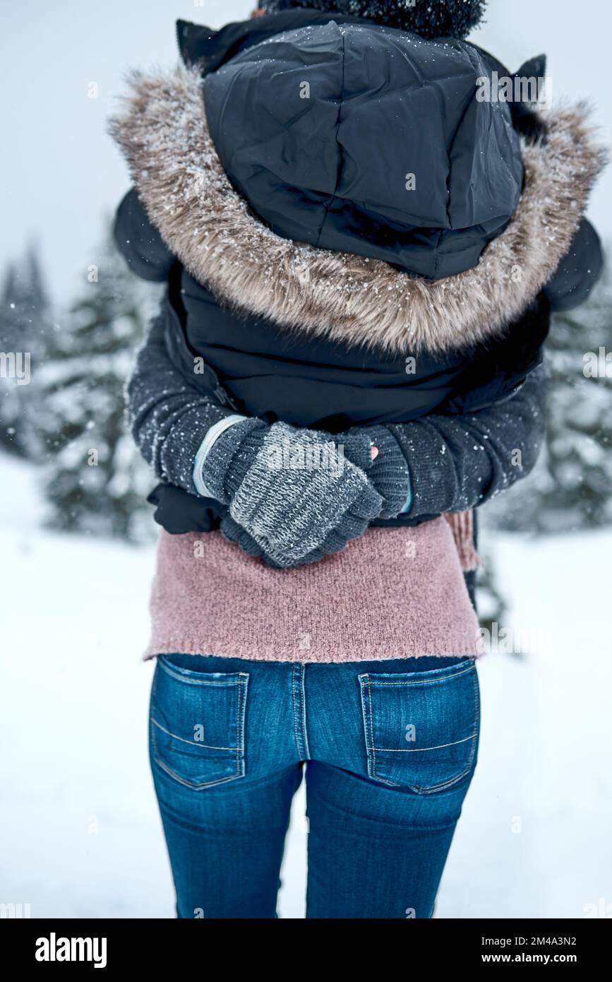 Man with arms around woman hi-res stock photography and images - Alamy