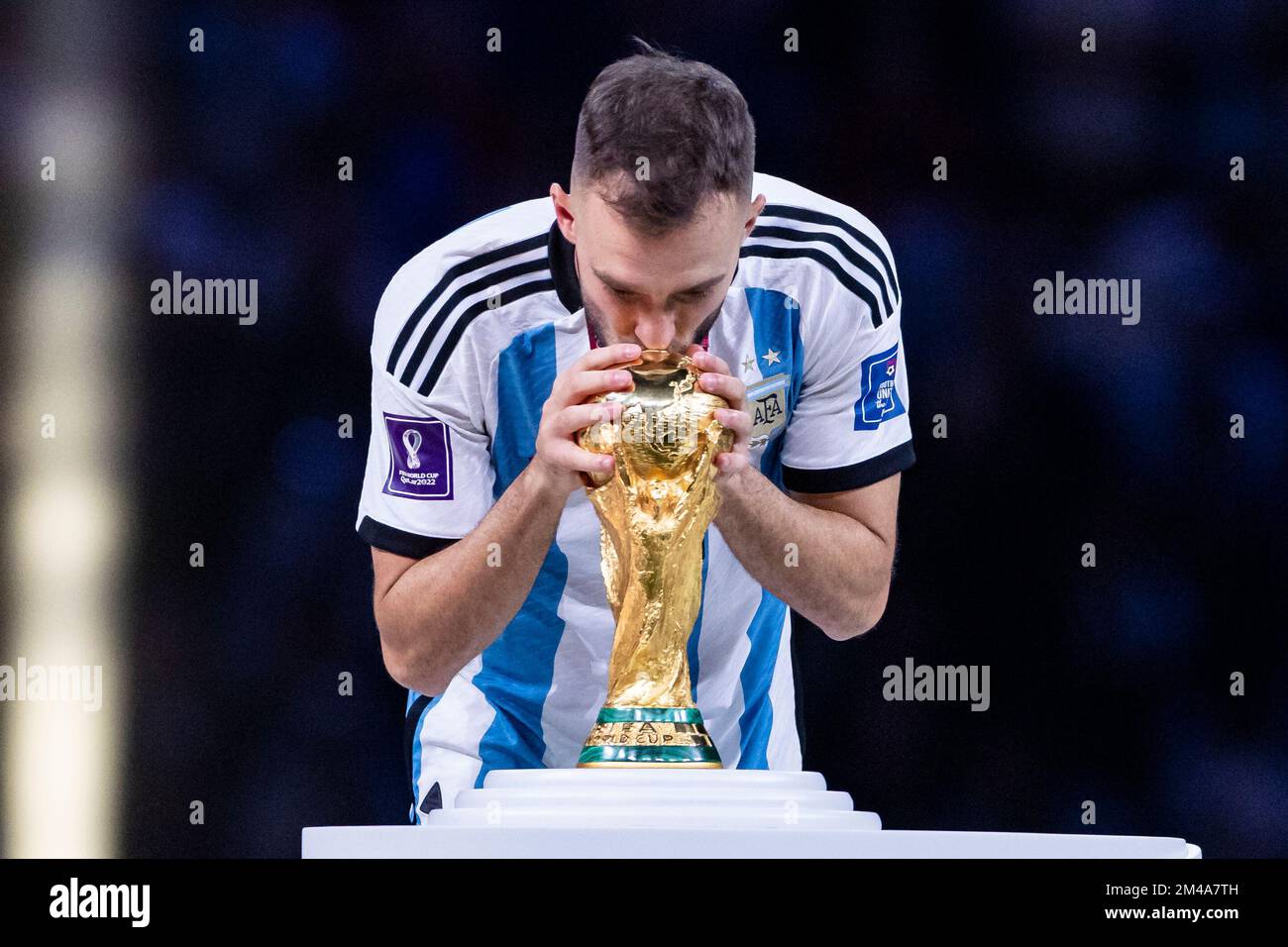 Lusail Iconic Stadium, Lusail, Qatar. 18th Dec, 2022. FIFA World Cup  Football Final Argentina versus France; Alexis Mac Allister of Argentina  lifts the world cup trophy Credit: Action Plus Sports/Alamy Live News