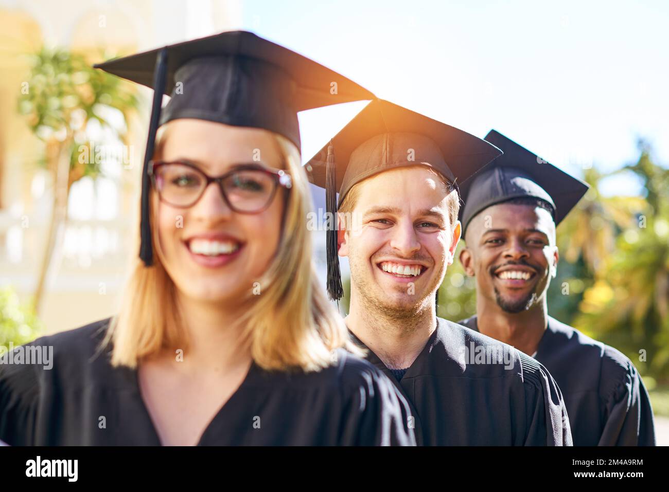 Were ready to give ourselves over to the professional world. students on graduation day from university. Stock Photo