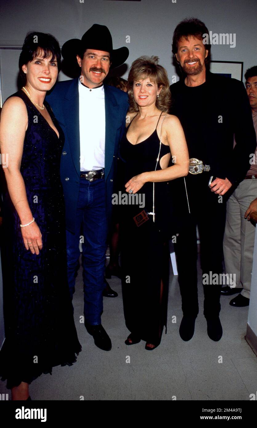 Brooks & Dunn with their wives at the Academy of Country Music Awards