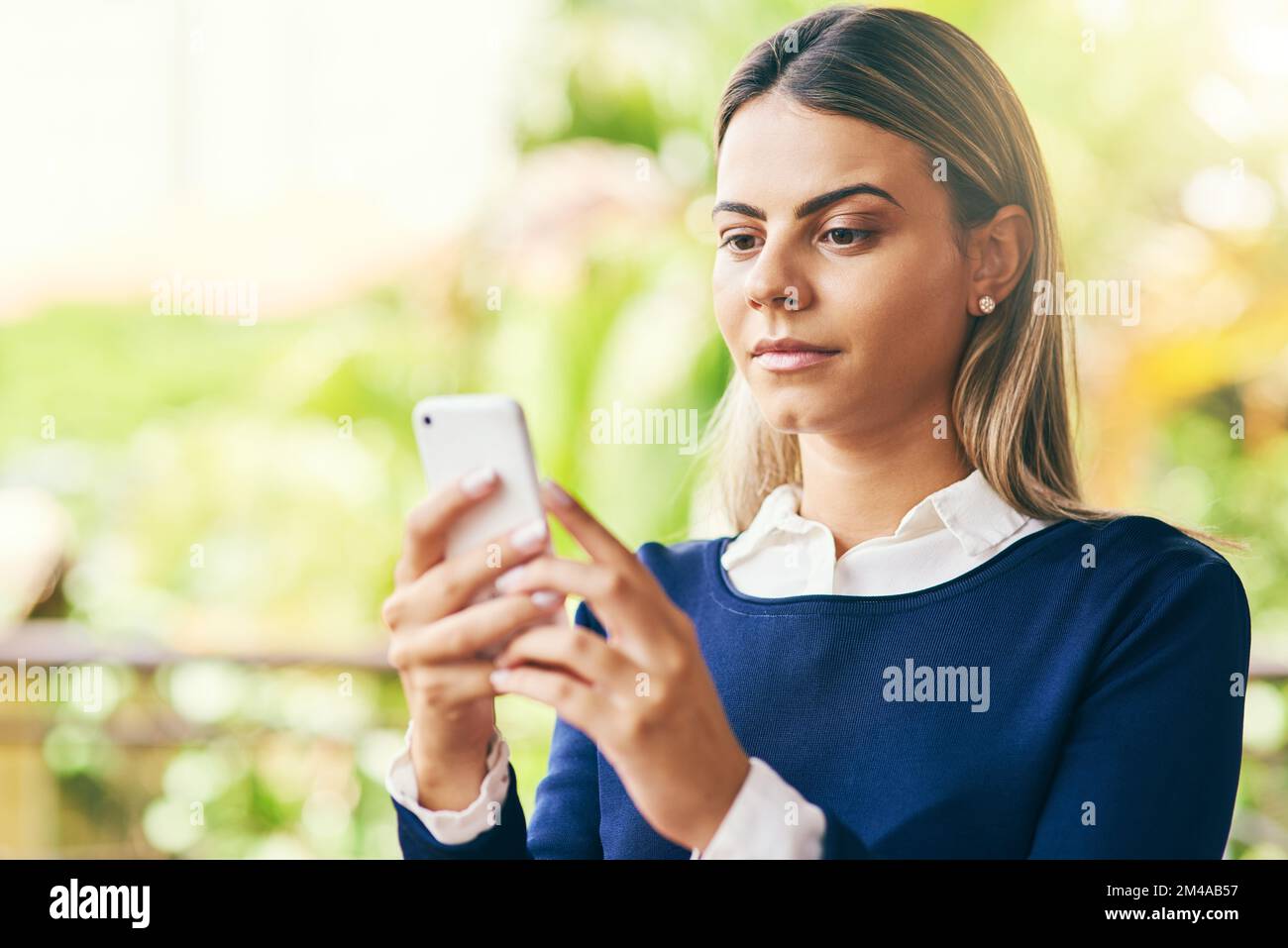 Where can my friends be. a focussed young woman browsing on her ...