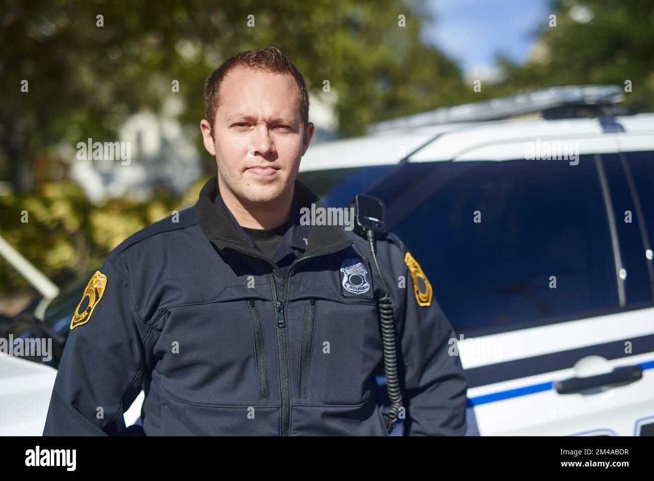 Im here for your safety. Cropped portrait of a handsome young policeman out on patrol. Stock Photo