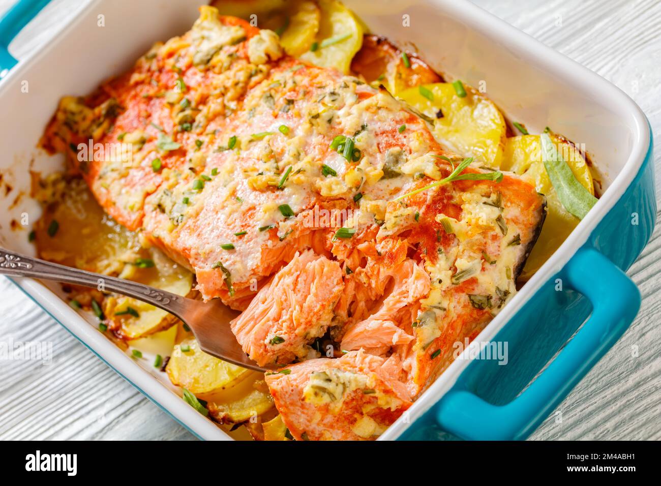 almon with potato and tarragon horseradish sour cream sauce in baking