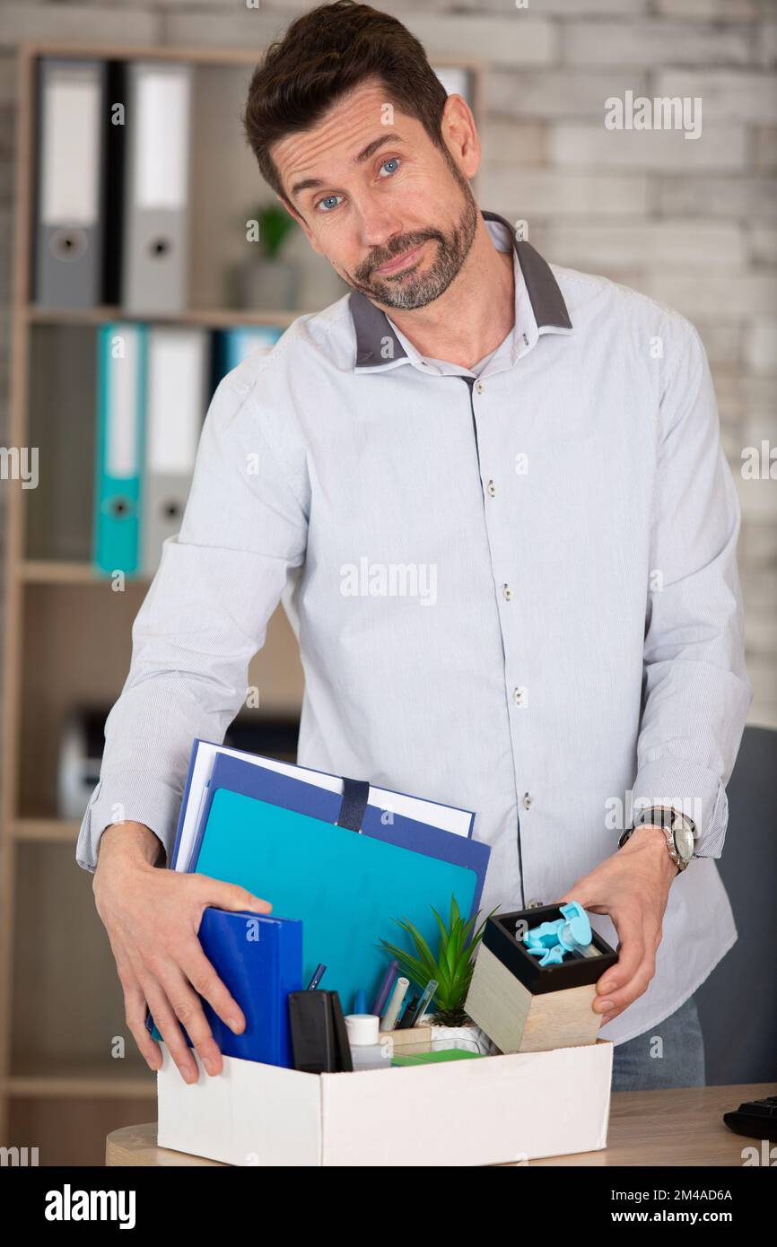 sad fired businessman sitting outside meeting room after being sad fired businessman sitting outside meeting room after being