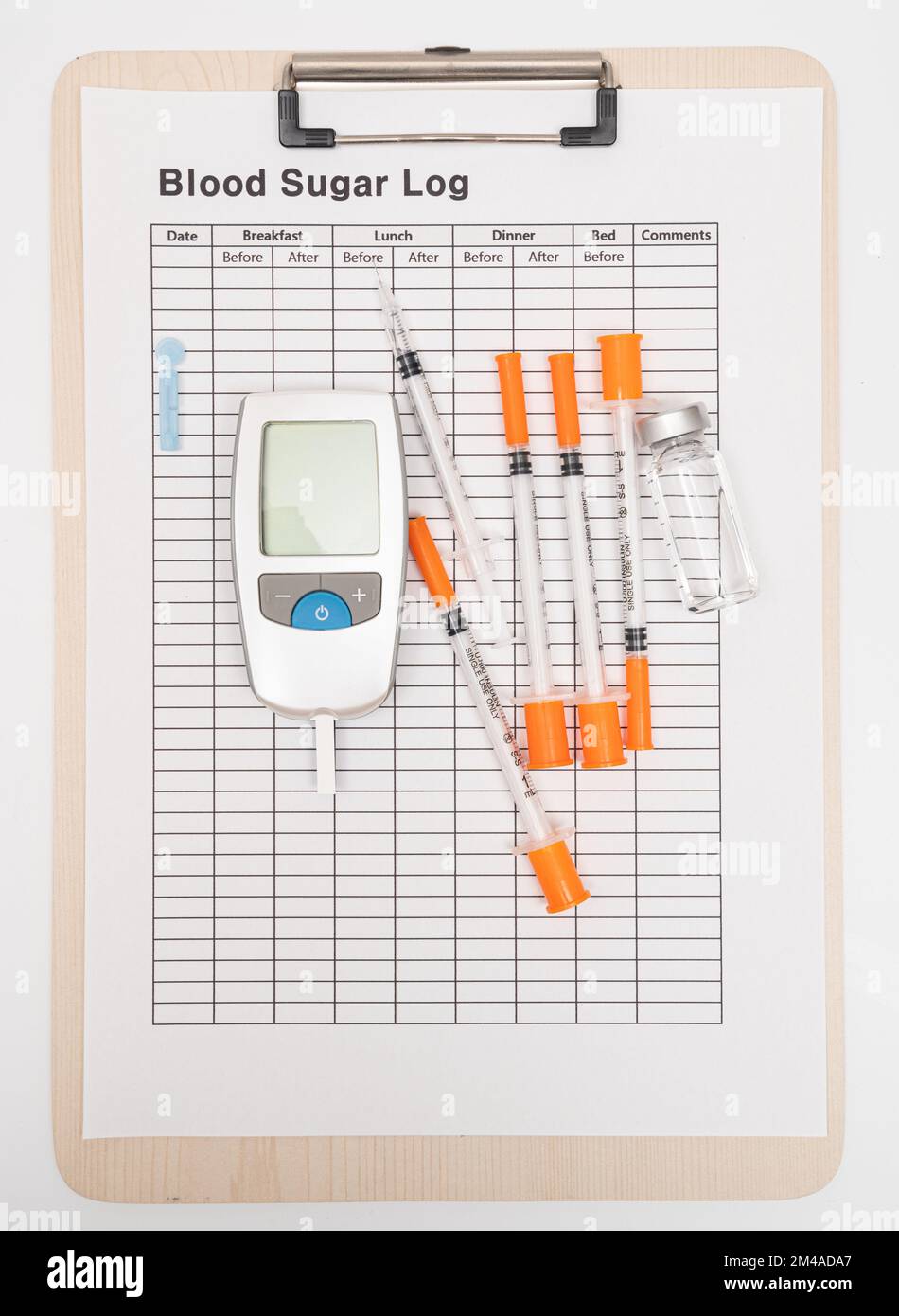 Glaucometer and insulin syringe, lancing device tester strip. On white background. Stock Photo