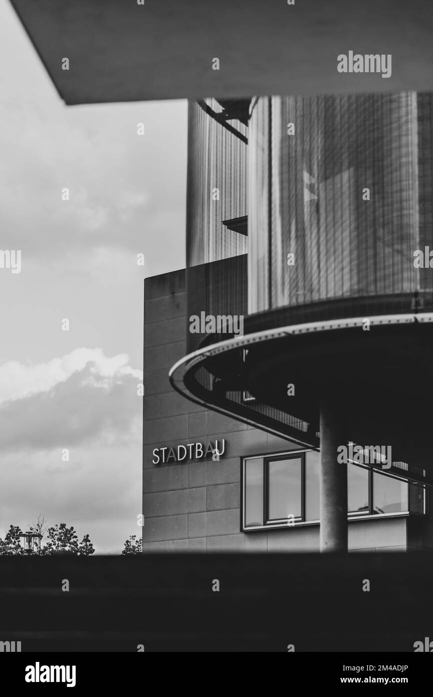 A vertical grayscale of modern buildings in Pforzheim, Germany Stock Photo