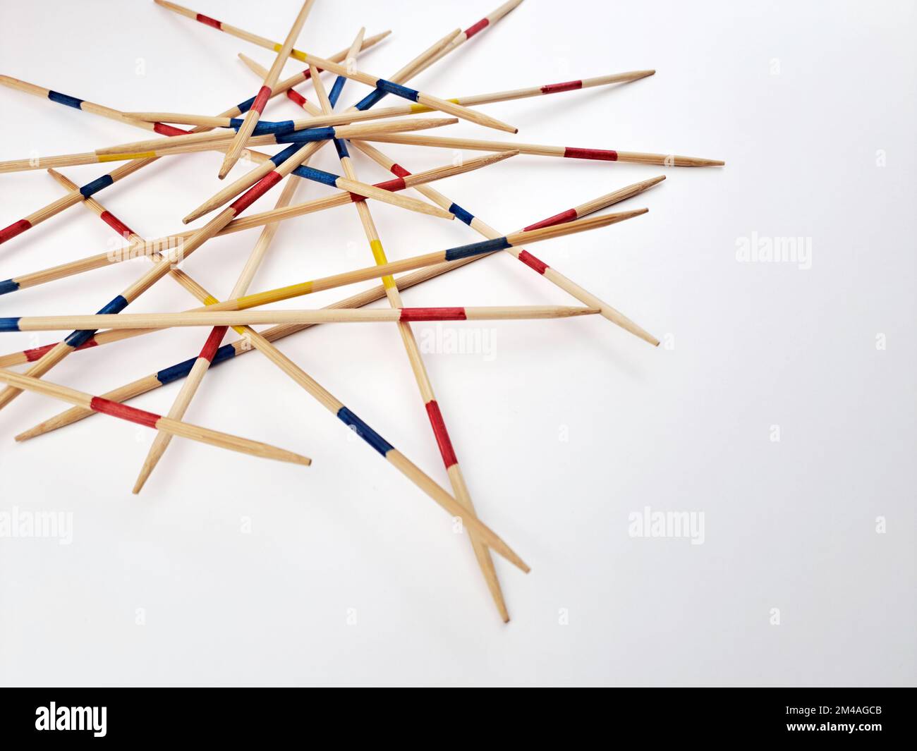 Mikado Board Game With Wooden Sticks. Gradient light background Stock