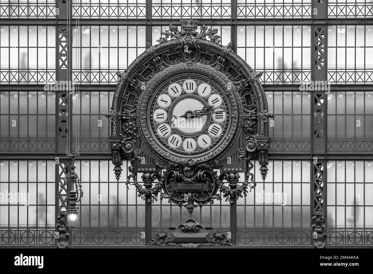 A grayscale of a beautiful vintage clock with an intricate and detailed ...