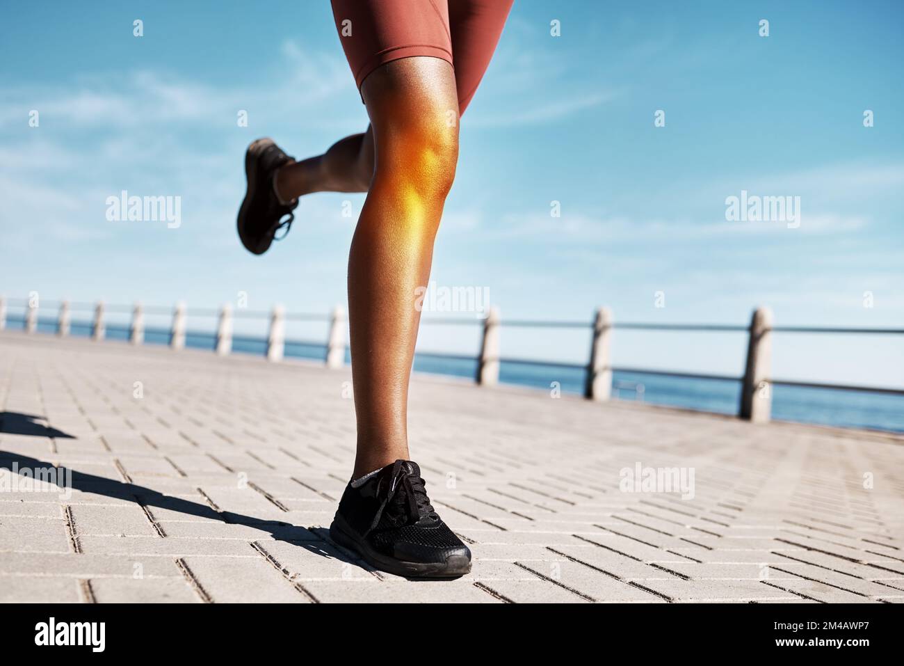 Black woman runner, knee pain and legs by promenade, street or training