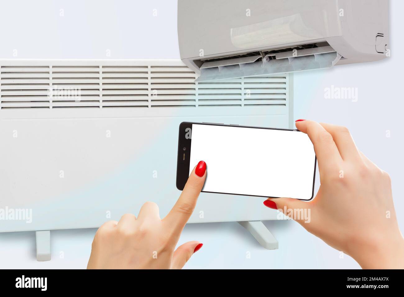 electric heater and air conditioner controlled by phone Stock Photo Alamy