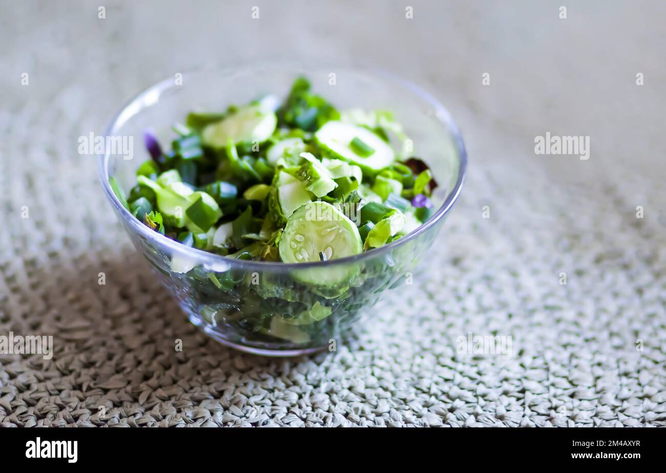 Fresh vegetable sald. Healthy food. Cucumbers and green dill. Stock Photo