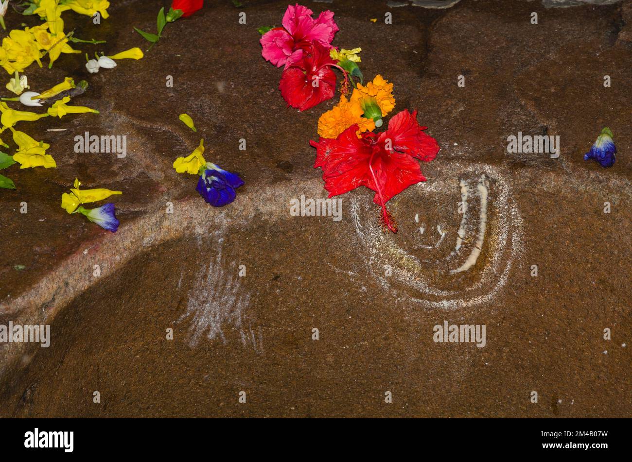 Flowers are always part of offerings in the big Shiva-Mandir in Sibsagar Stock Photo