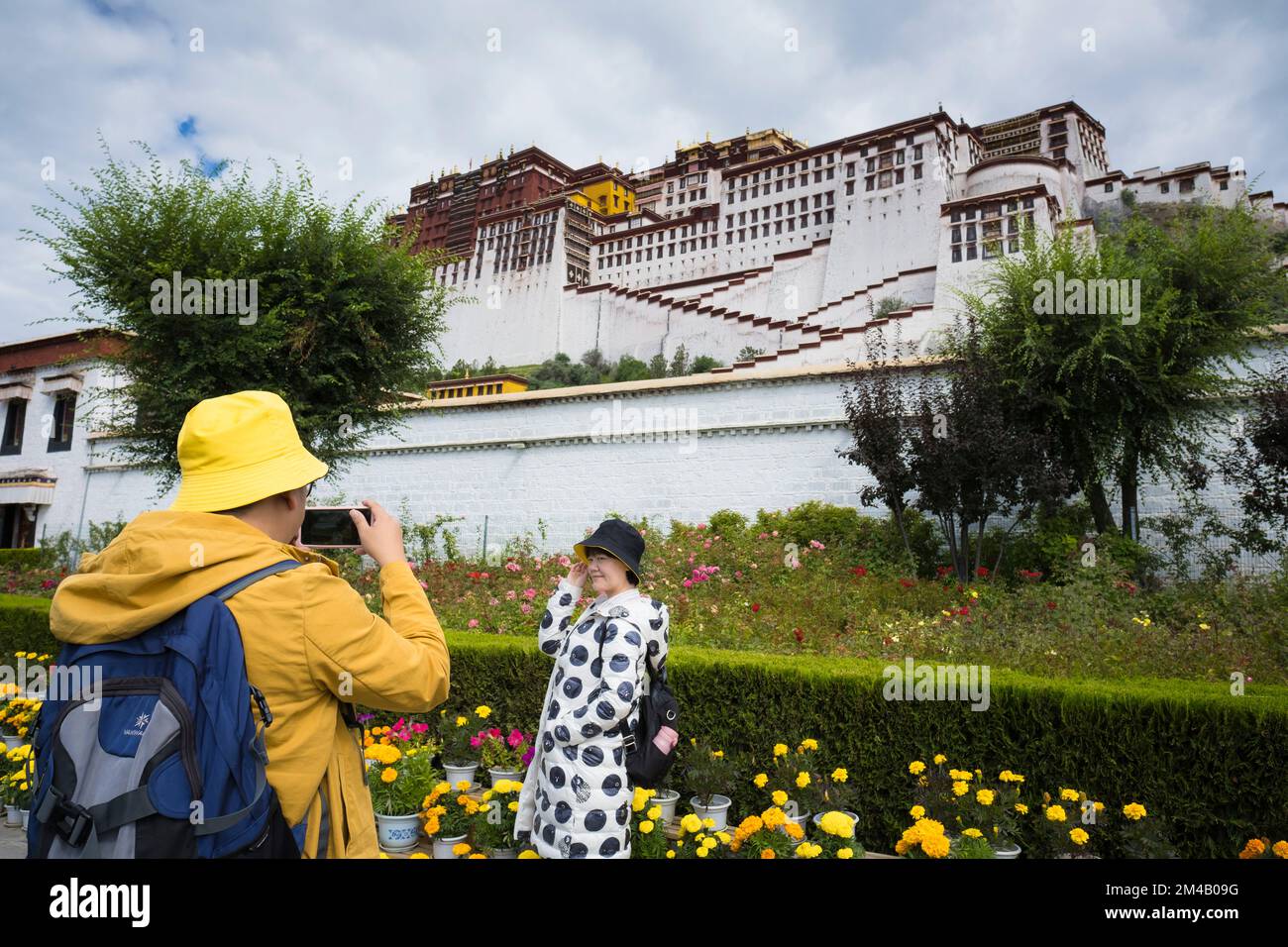 Chinese tourists take pictures in the Potala Palace, a UNESCO heritage site. Lhasa. Tibet Autonomous Region. China. Stock Photo