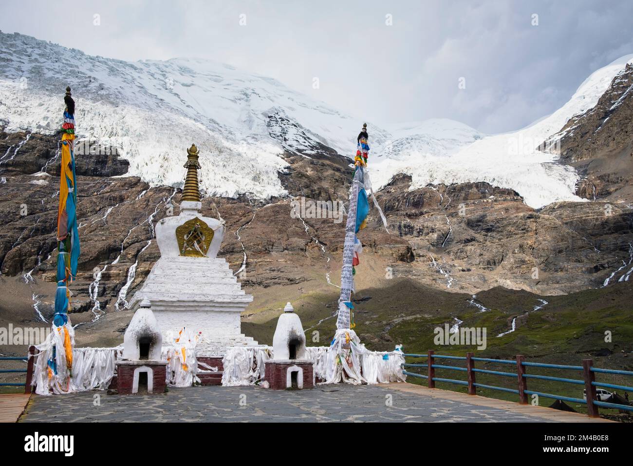 Large white stupa in front of Karo La Glacier. Tibet Autonomous Region. China. Stock Photo