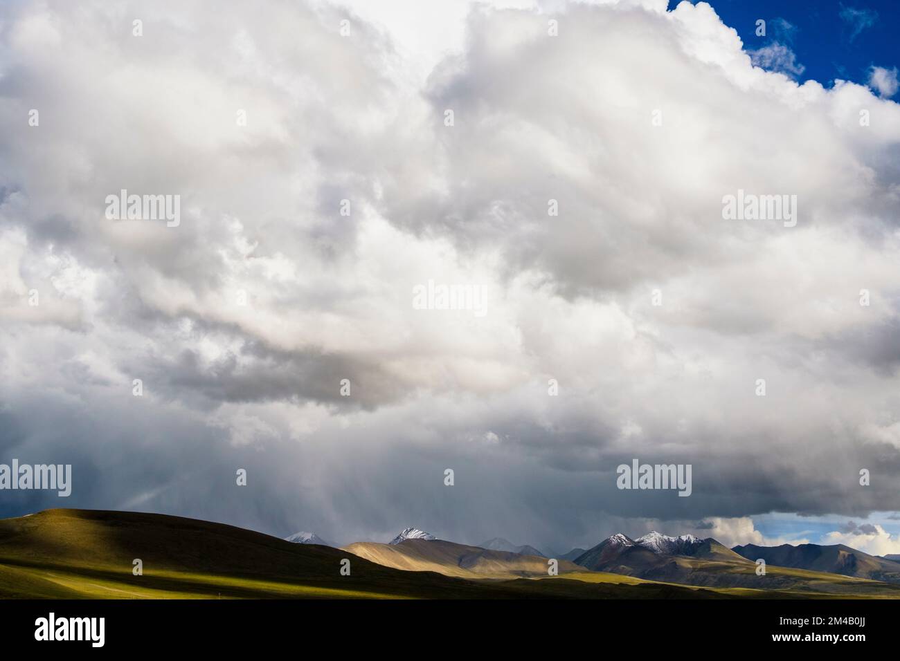 View of the Tibetan plateau with snow-capped mountains in the background. Tibet Autonomous Region. China. Stock Photo