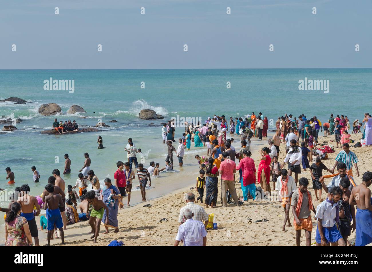 Many Indians on the beach at Indias southern tip.  Kanyakumari ,  India Stock Photo