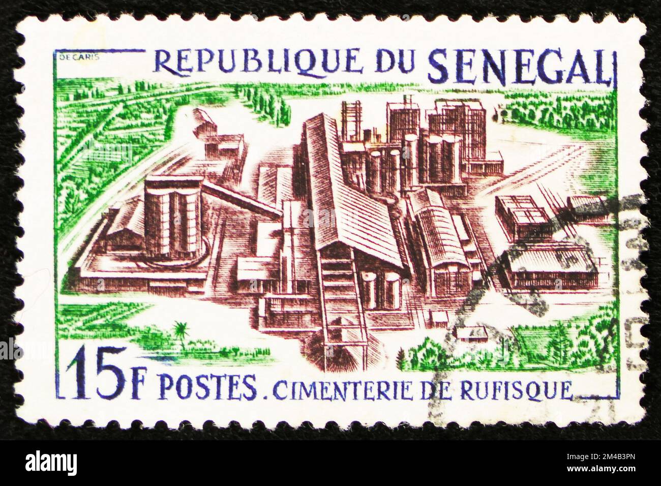 MOSCOW, RUSSIA - OCTOBER 29, 2022: Postage stamp printed in Senegal shows Cement factory, Rufisque, Industrialization serie, circa 1964 Stock Photo