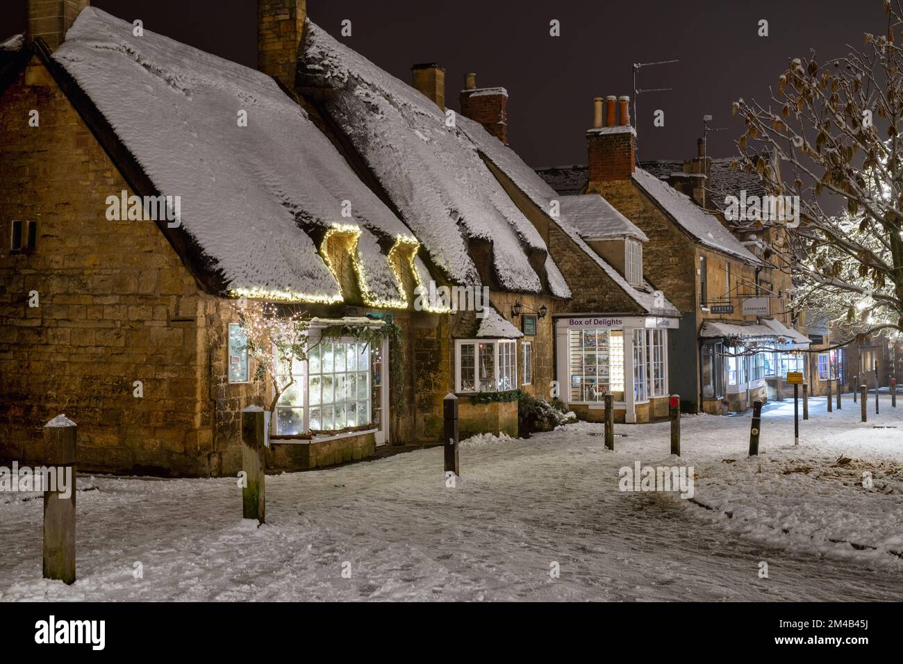 Whatever the Weather gift shop in the snow at night. Broadway, Cotswolds, Worcestershire