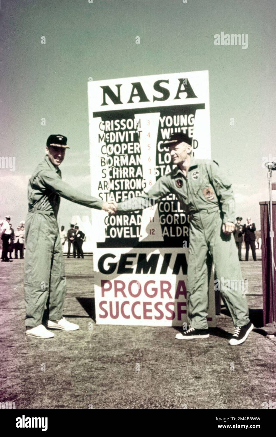 Project Gemini 12:  Austronauts Lovell and Aldrin in front of the summary table of Gemini flights, November 1966 Stock Photo
