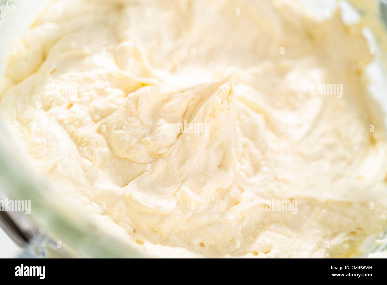 White chocolate ganache frosting Stock Photo Alamy