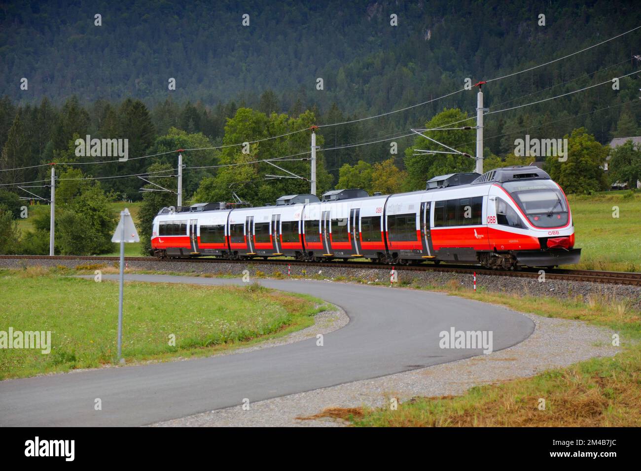 CARINTHIA, AUSTRIA - AUGUST 7, 2022: Bombardier Talent passenger train of Austrian Federal Railways OBB traveling in Carinthia, Austria. Stock Photo