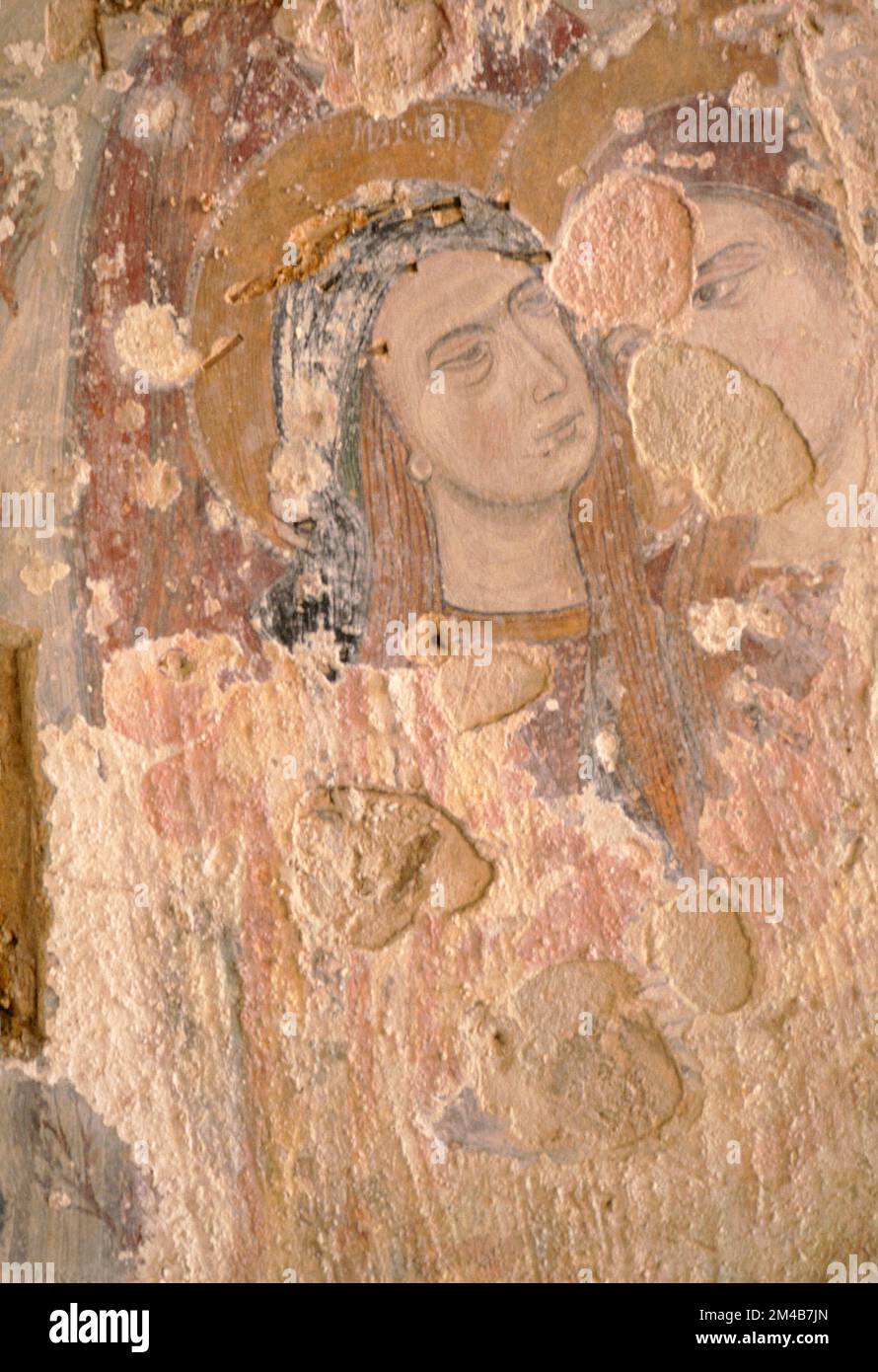 Ancient fresco of religious theme partly ruined at Sassi di Matera, Italy 1994 Stock Photo