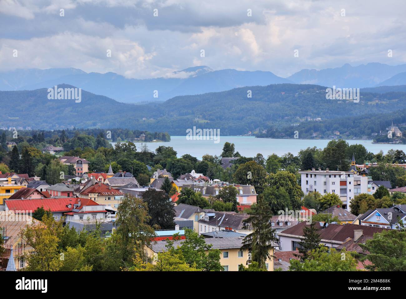 Worthersee mountain lake in Austrian Alps. Austria landscape in State of Carinthia. Town of Portschach am Worther See (Poertschach). Stock Photo