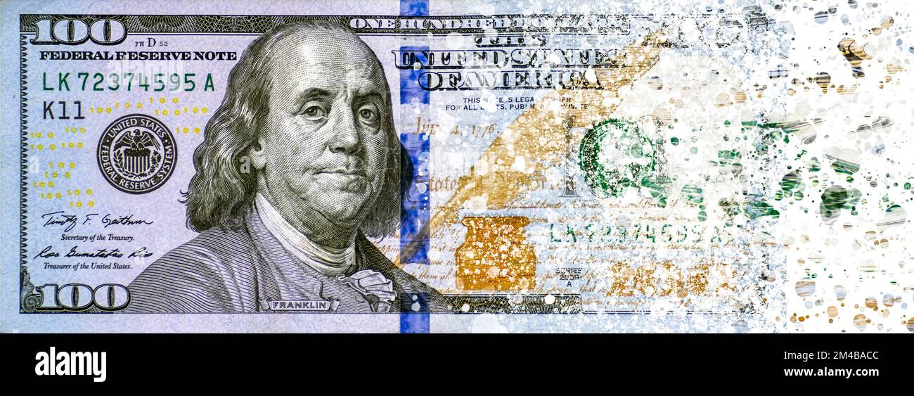 hundred dollars bill disintegration on a white background Stock Photo