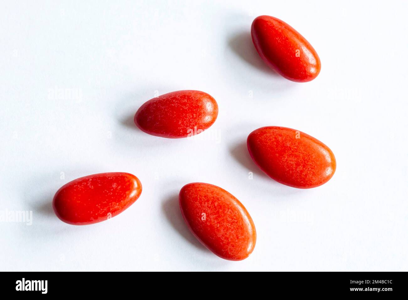 Red Sugared Almonds Of Graduation Alzano Lombardo Italy Stock Photo red-sugared-almonds-of-graduation-alzano-lombardo-italy-stock-photo