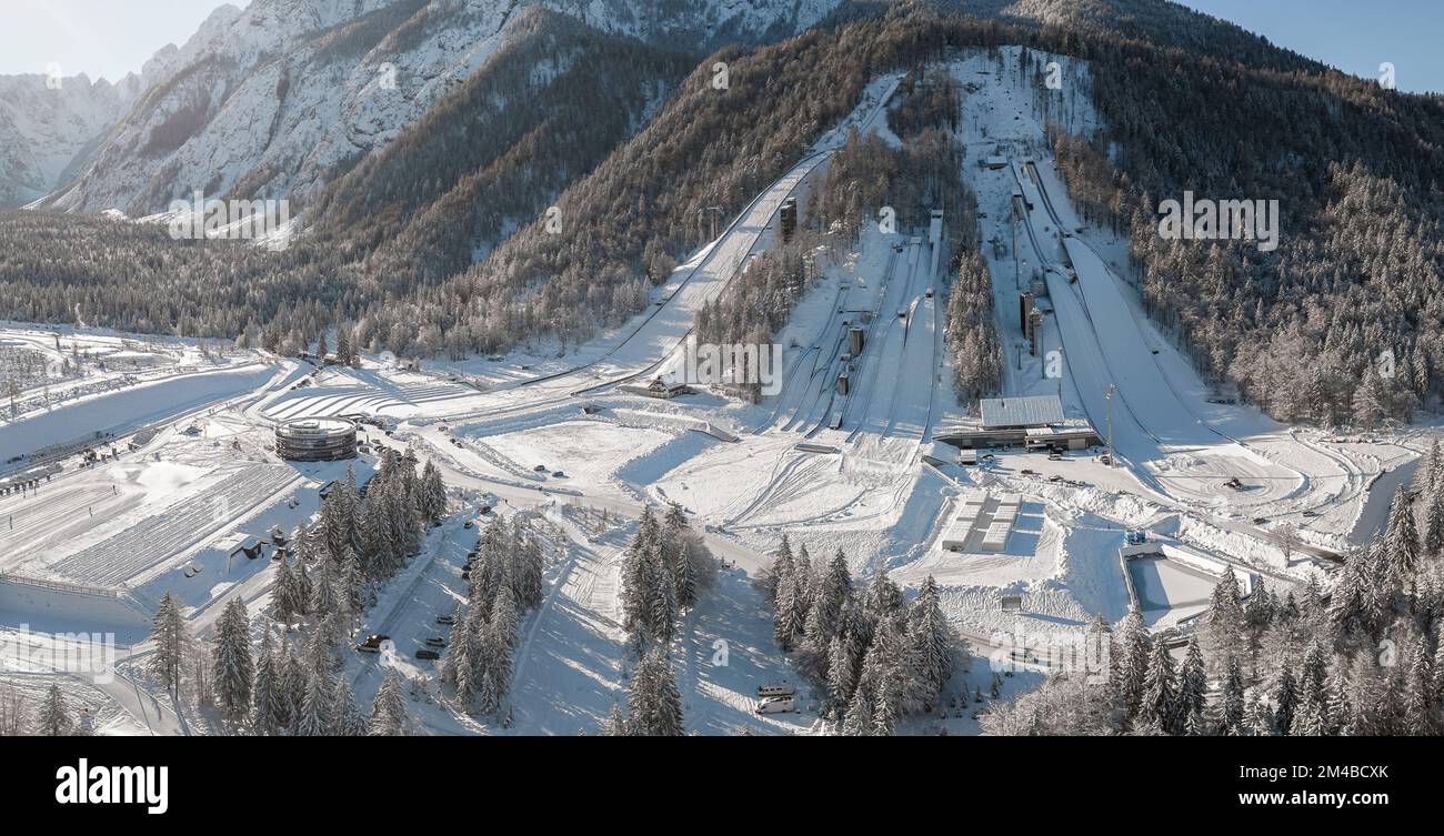 Ski Jump in Planica near Kranjska Gora Slovenia covered in snow at winter time. Aerial Panorama Stock Photo