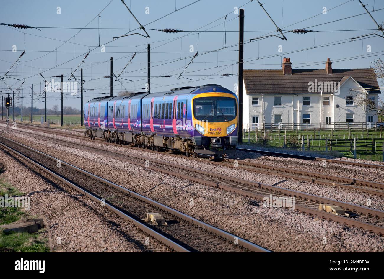 First Transpennine Express class 185 diesel train 185151 on the 4 track electrified east coast mainline at Newsham Stock Photo