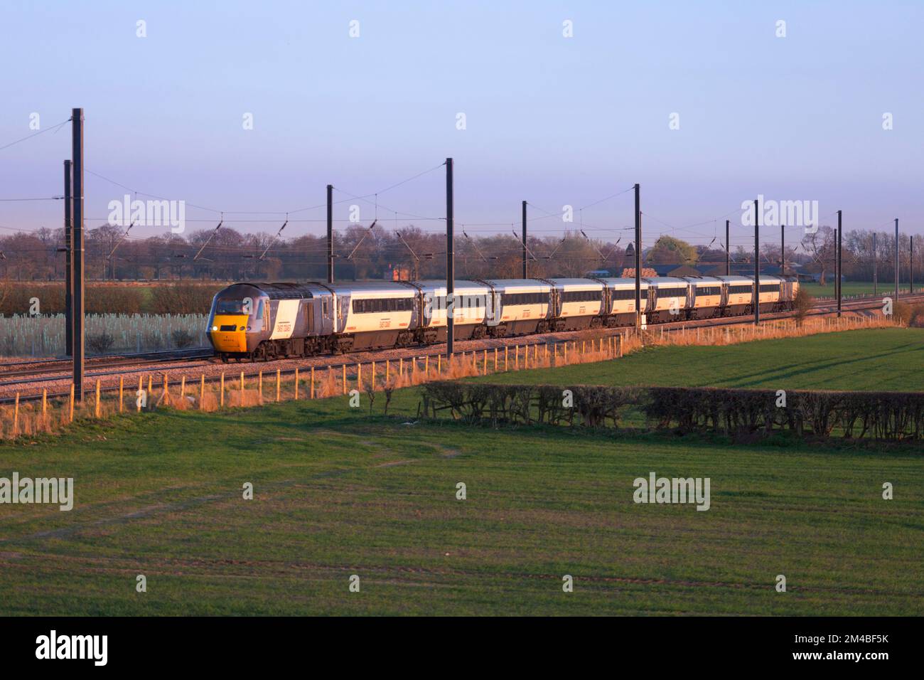 An East coast trains Intercity 125 heads north near Thirsk during the period when the east coast franchise was publicly run Stock Photo