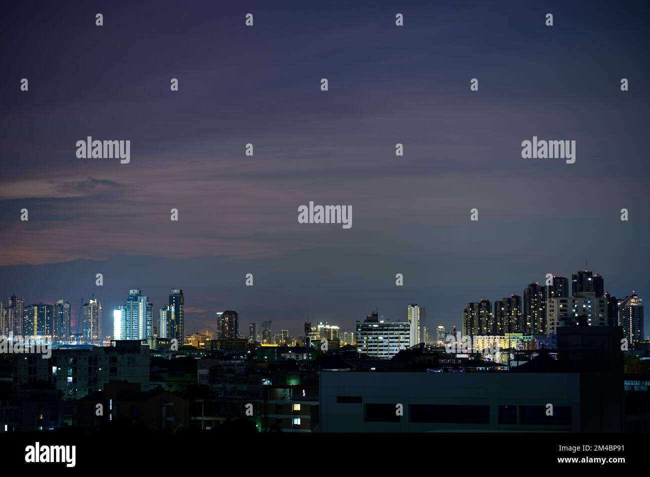 An aerial view of modern buildings during the dark night Stock Photo ...