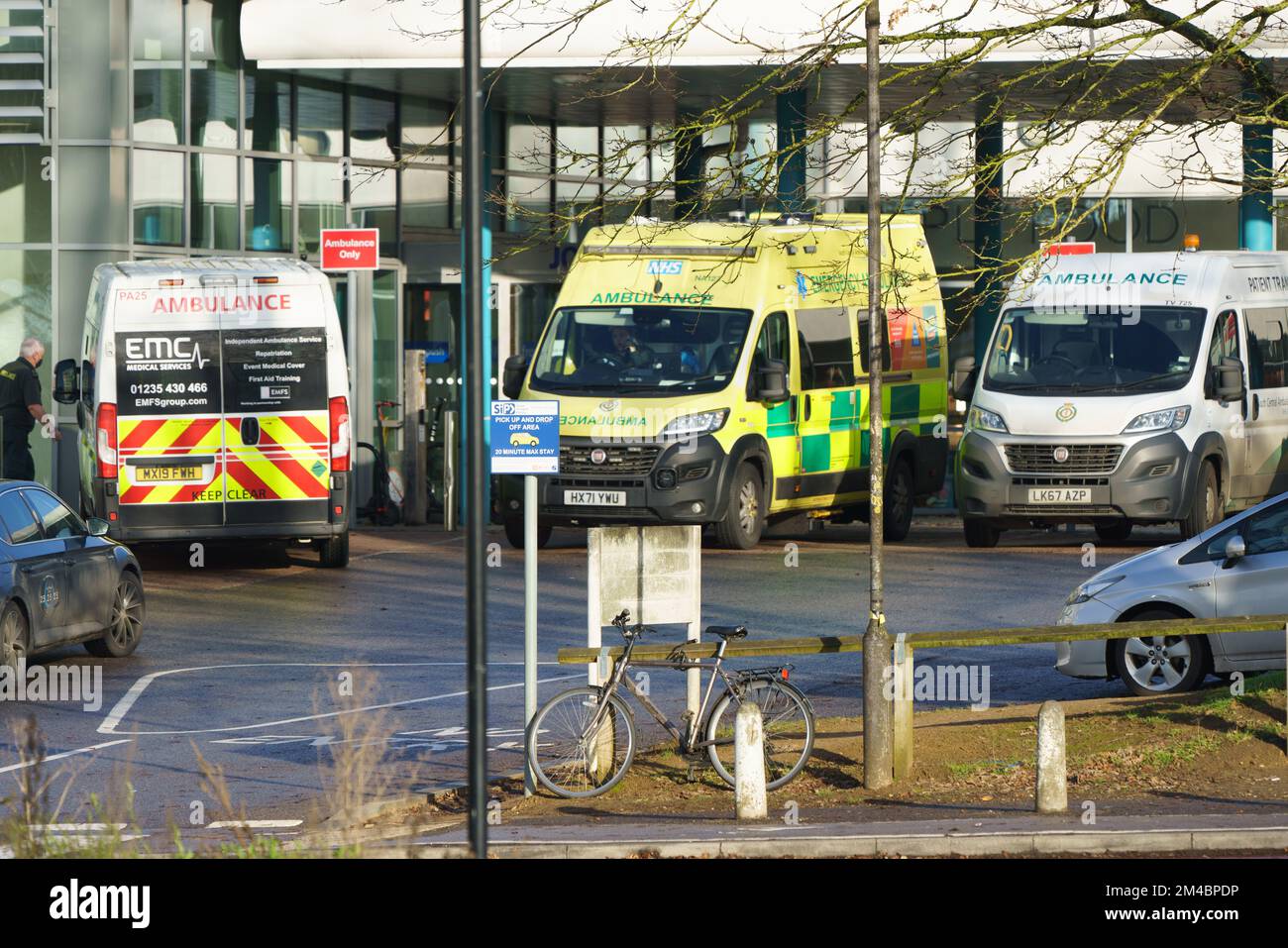 December 20th 2022. Oxford, UK. Following on from the nures strike, Ambulance crews in England and Wales will strike tomorrow December 21st. PICTURED: Ambulances wait at The John Radcliffe Hospital, Oxford. Bridget Catterall/AlamyLiveNews Stock Photo