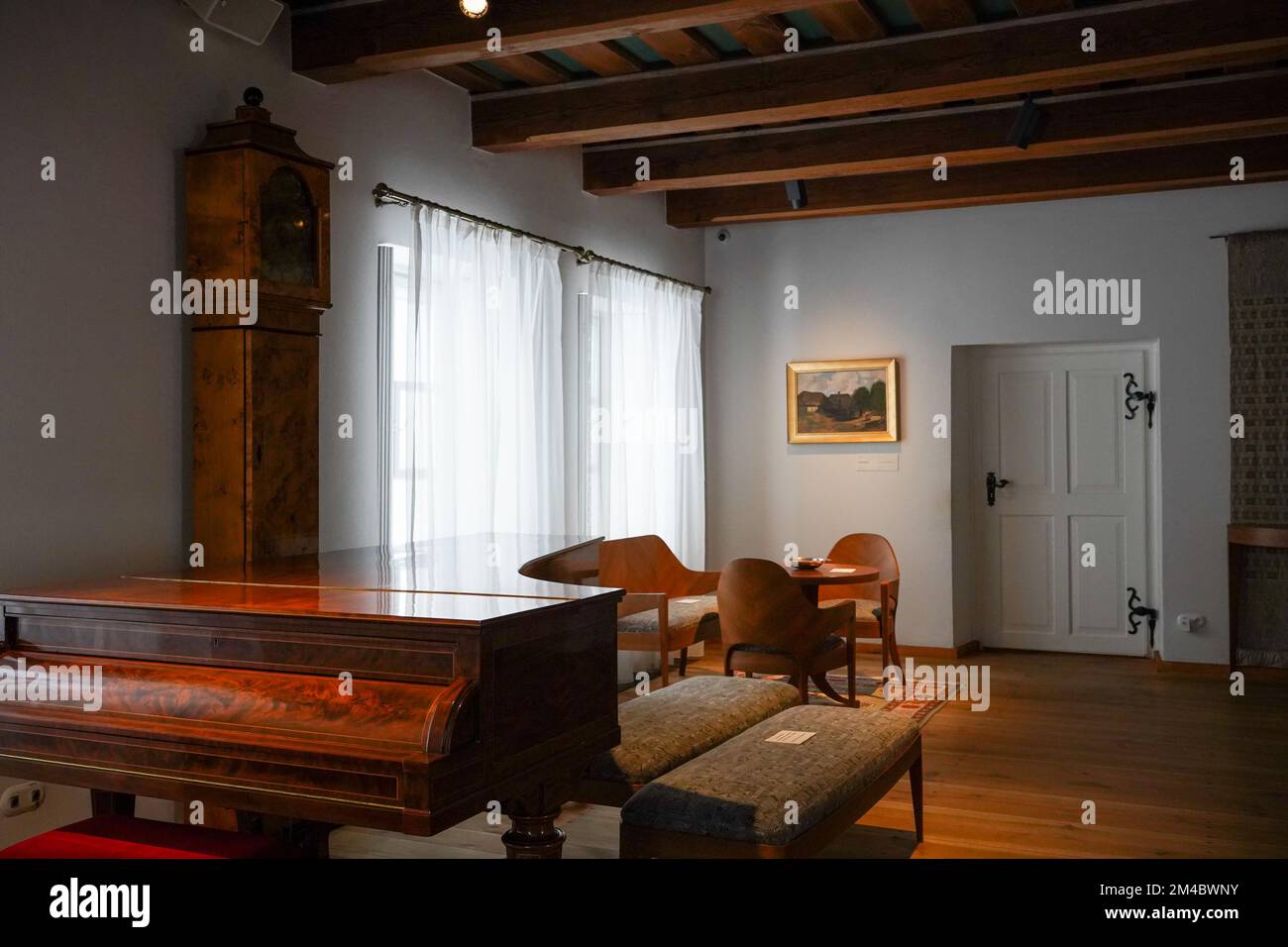 Room in old manor-house which is the Birthplace of Frederic Chopin in Zelazowa Wola, Poland. There's  brown 19th century Erard - period piano. Stock Photo