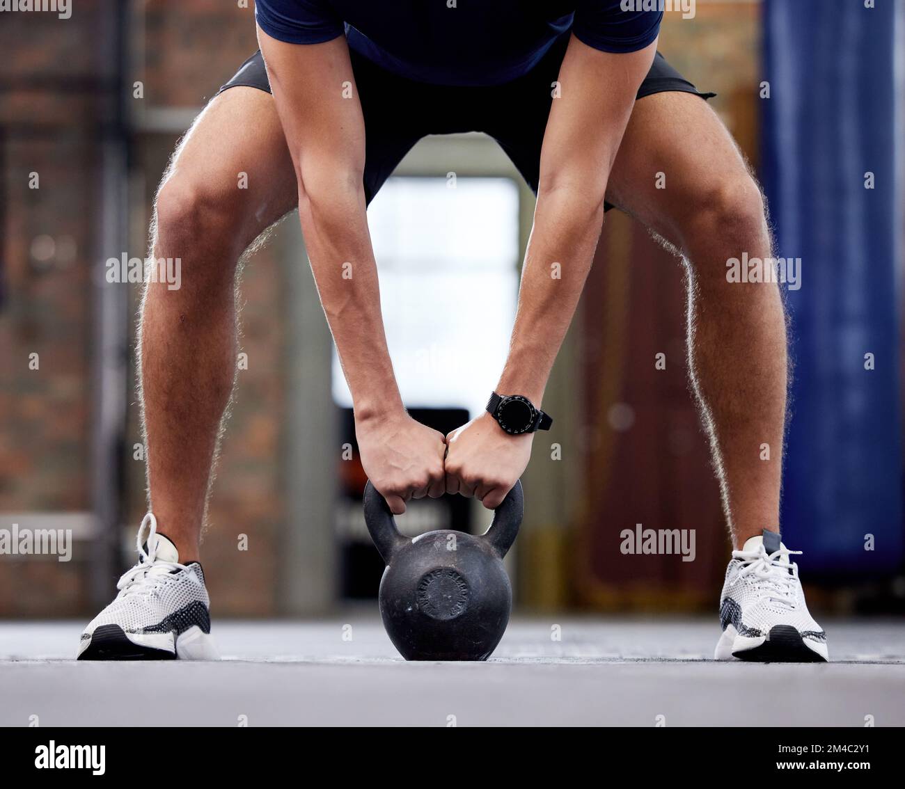Kettlebell, gym fitness and man hands doing bodybuilder, wellness and strong training for arms. Workout, exercise and power lift of athlete doing Stock Photo